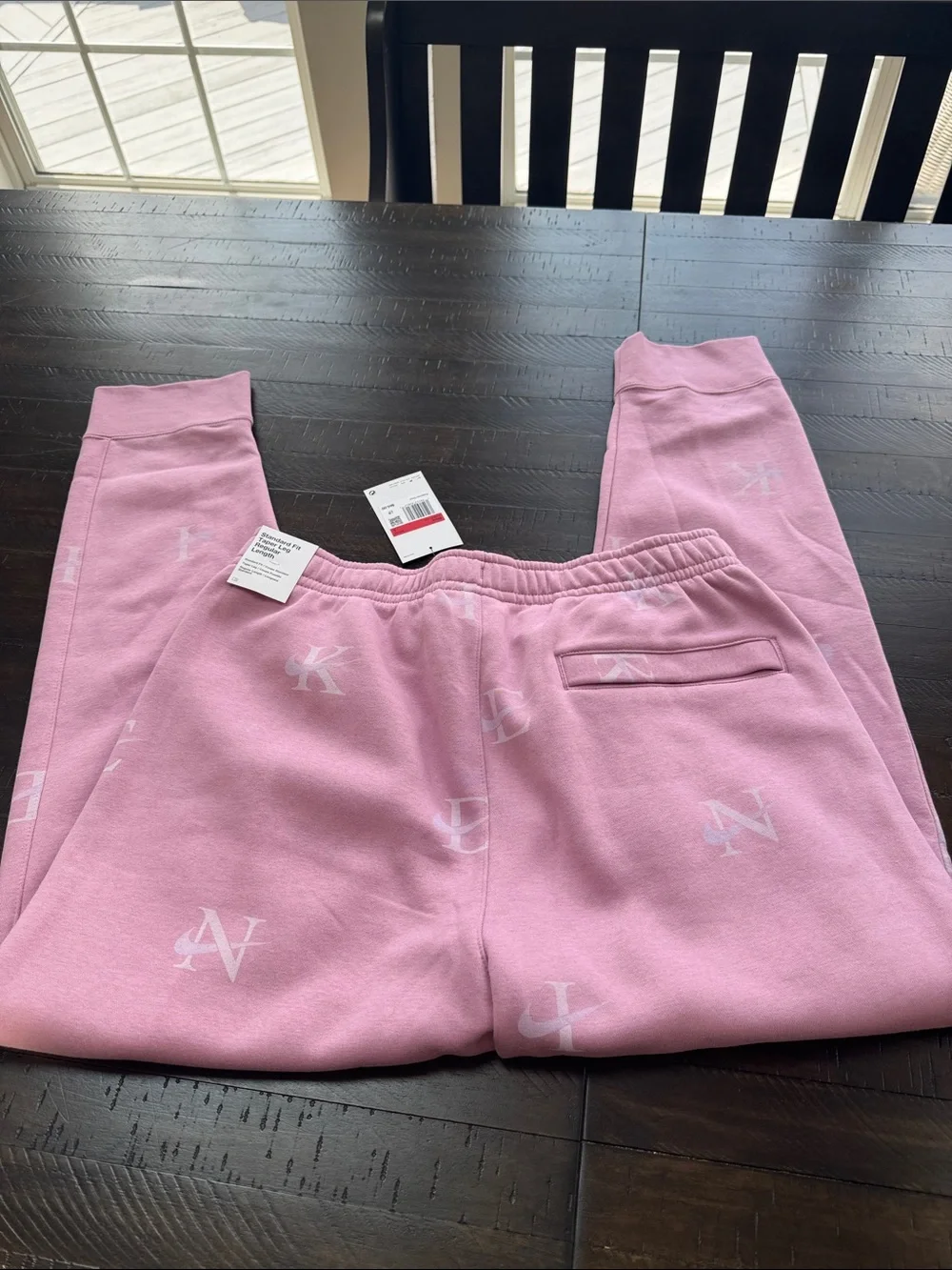 NWT Nike Men’s Pink Tapered Joggers with Subtle Logo